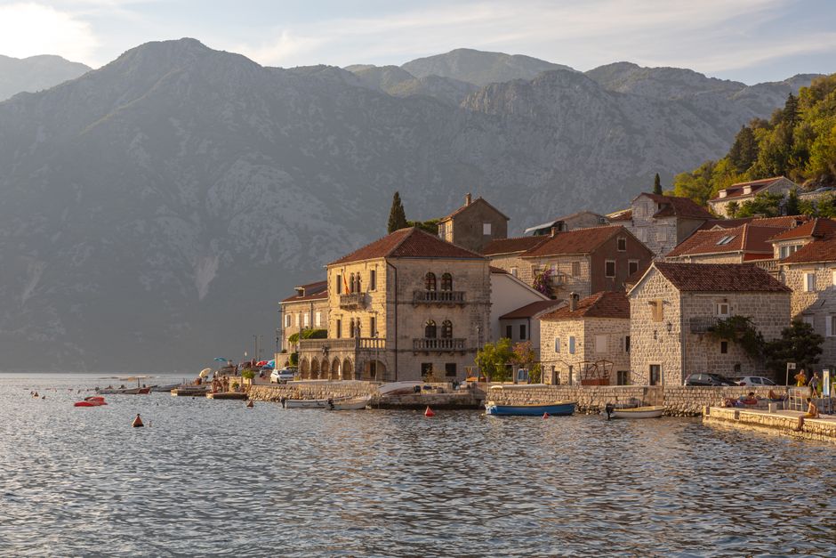 Qeparo Village Albania stone houses harbor fishing boats