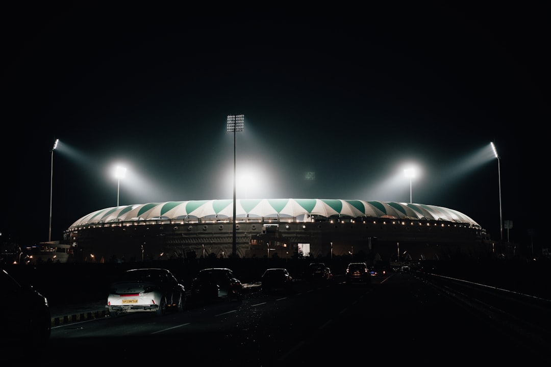 Balkan football fans cheering stadium night