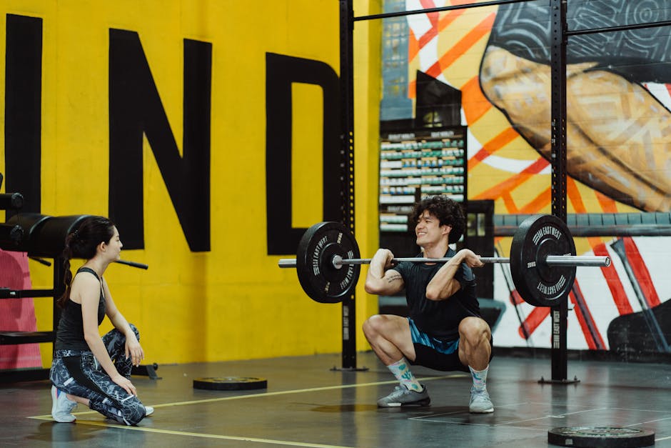 young Bulgarian weightlifters training in modest gym chalk dust focused faces barbell rack background