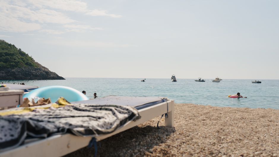 Bačvice Beach Neum Bosnia pebbles sunbeds clear water