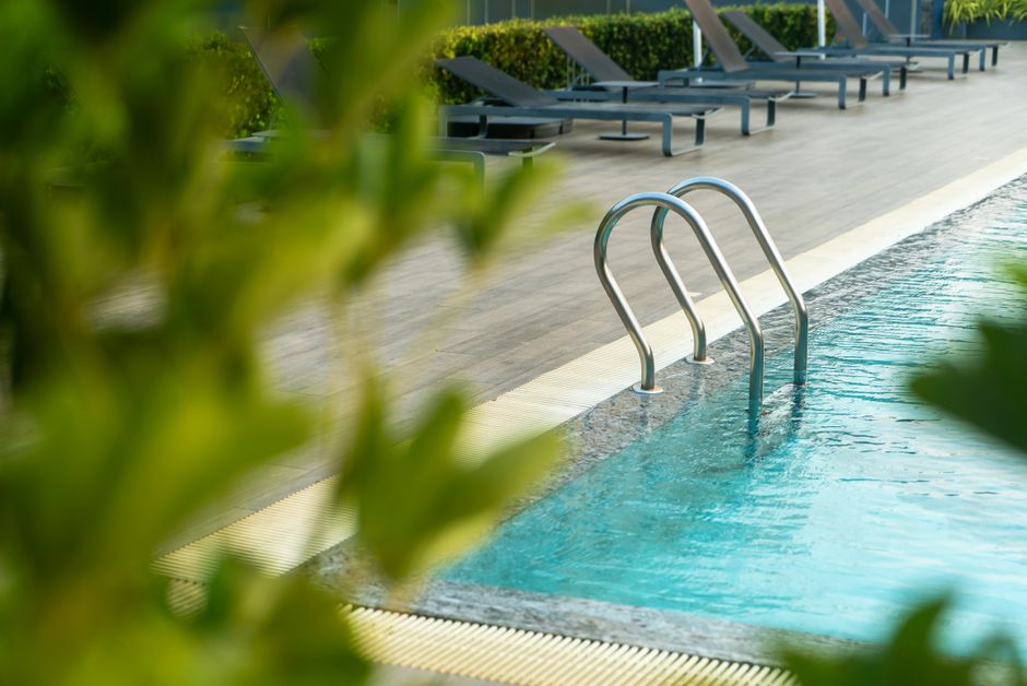 Albena Spa thermal pool clear blue water relaxation lounge chairs