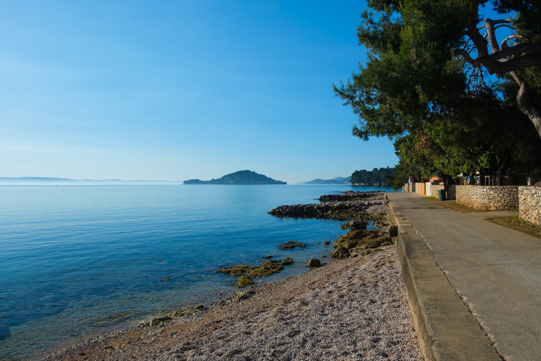Crystal clear Adriatic Sea coastline Croatia sunset