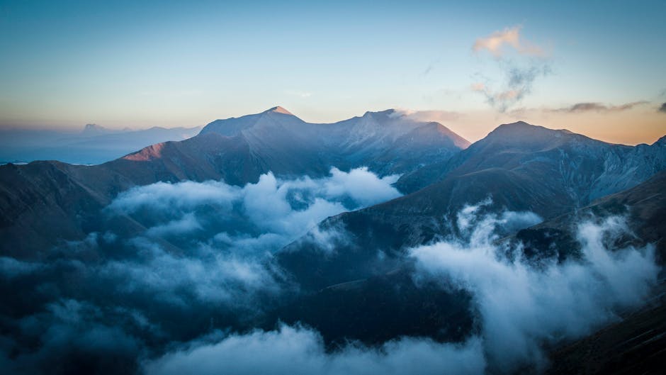 Mount Olympus Greece Mytikas Peak dramatic clouds sunrise