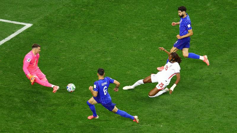 Livaković's Wall: 7 Saves vs England, World Cup Record Alert!