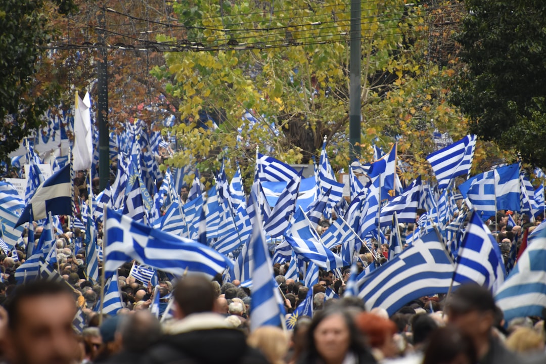 Greek football fans watching match betting shop