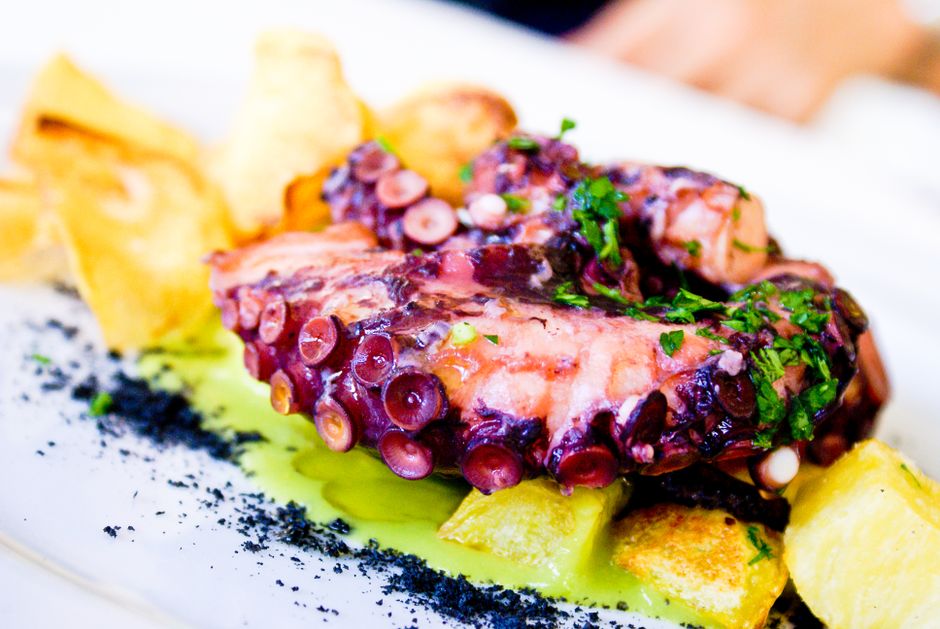 Ksamil Albania grilled octopus plate lemon olive oil