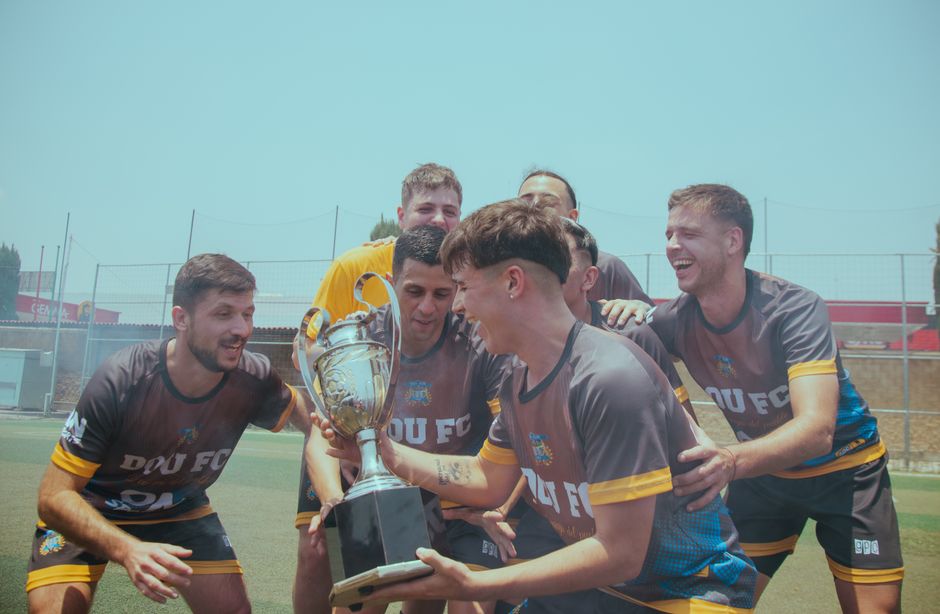 Panathinaikos players celebrating GBL championship trophy Athens