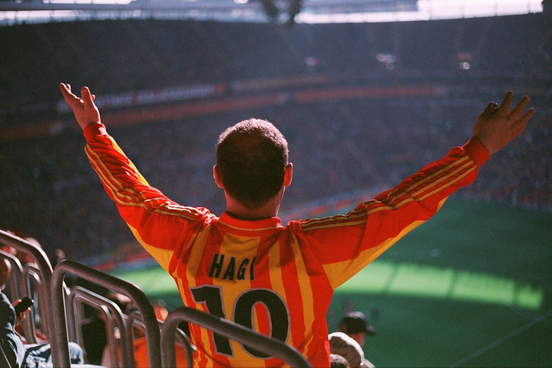Galatasaray stadium night match crowd cheering