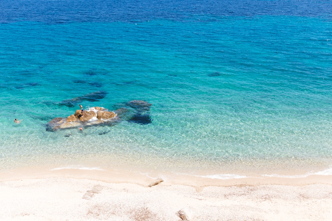 Chasing Liquid Stars: Snorkeling the Bioluminescent Bays of Milos