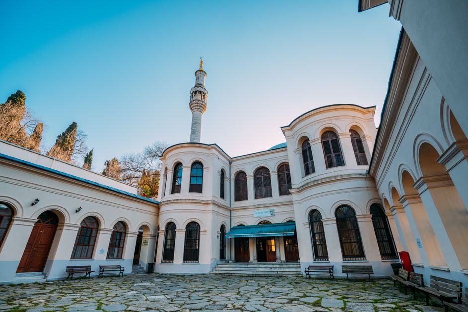 Et'hem Bey Mosque Tirana courtyard minaret sunset
