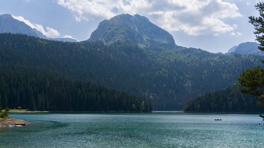 Crno Jezero Durmitor National Park Montenegro reflection mountain peaks mist