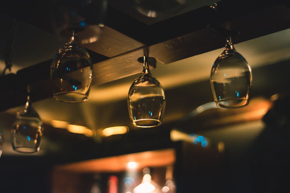 Sozopol old town bar live music wine glasses evening