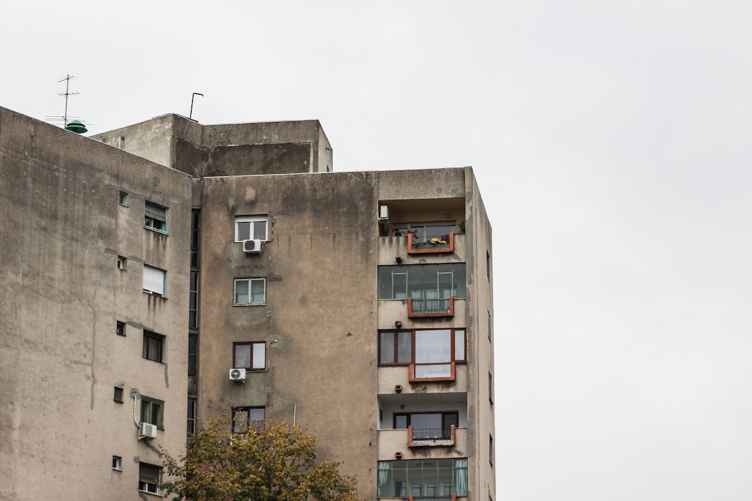 Emergency rescue teams inspecting building damage Bucharest