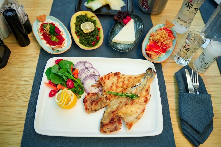 grilled carp fish Serbian restaurant river side plating