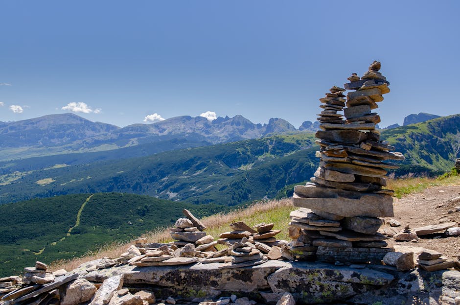 Musala Peak summit Bulgaria stone cairn panoramic view alpine ridge