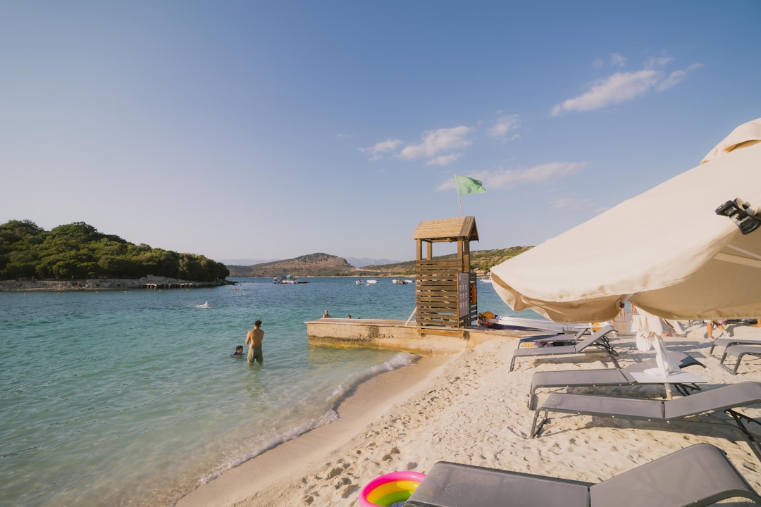 Ksamil Lagoon Albania calm shallow water families swimming