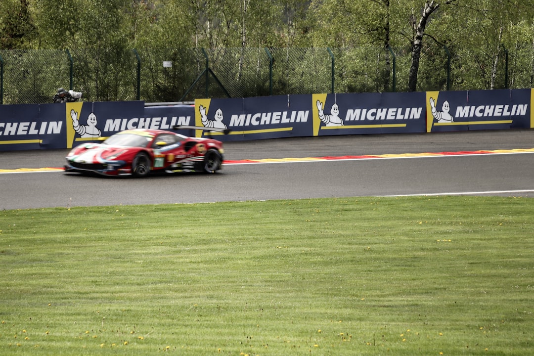 Ferrari tifosi fans waving flags race track