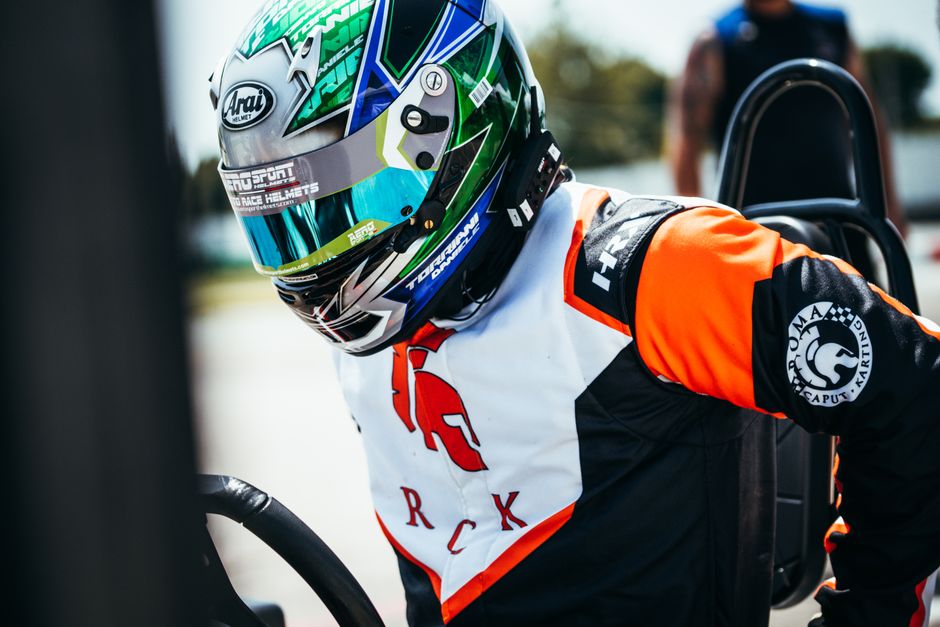 Nikola Tsolov driving MP Motorsport car helmet closeup