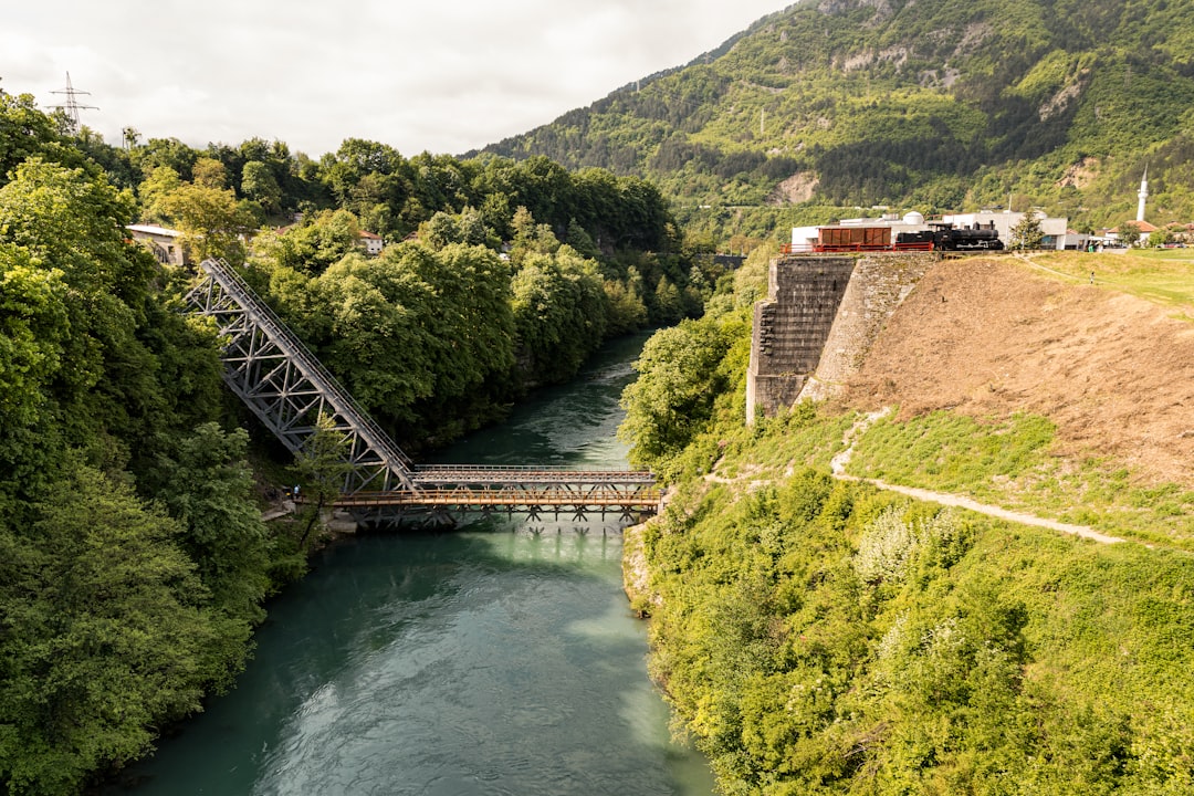 Abandoned concrete bunker on cliff side Neretva River Bosnia Herzegovina war relic
