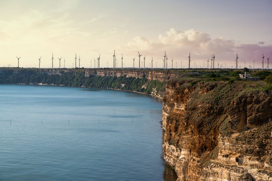 Kaliakra Cape cliffs limestone white against Black Sea blue sky morning light