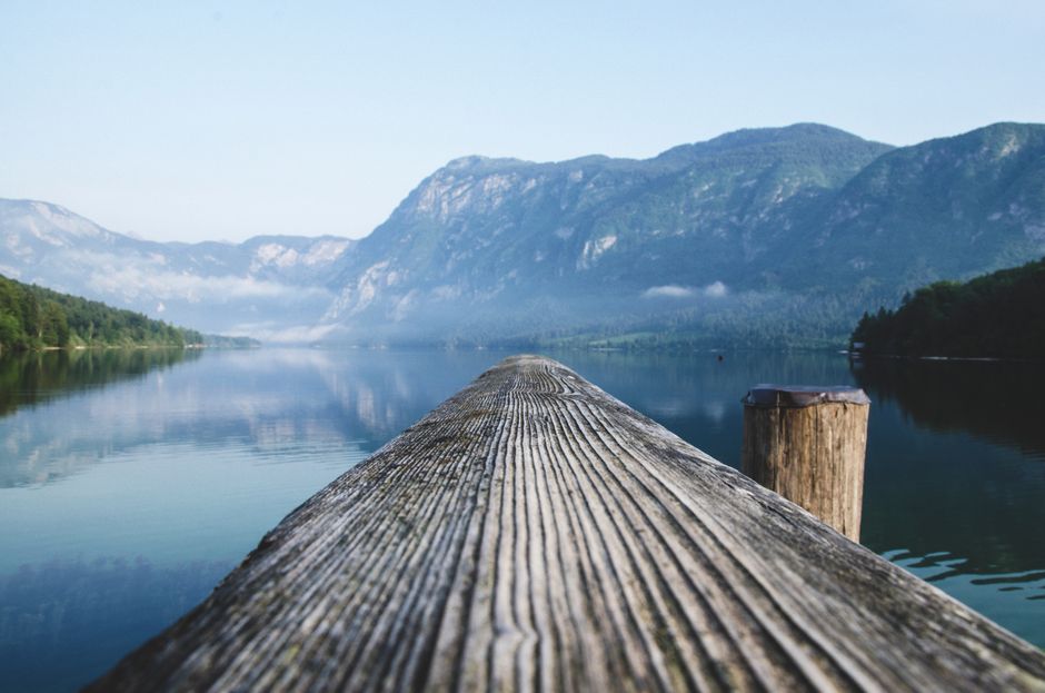 Bohinj Lake Slovenia reflection Julian Alps sunrise calm water