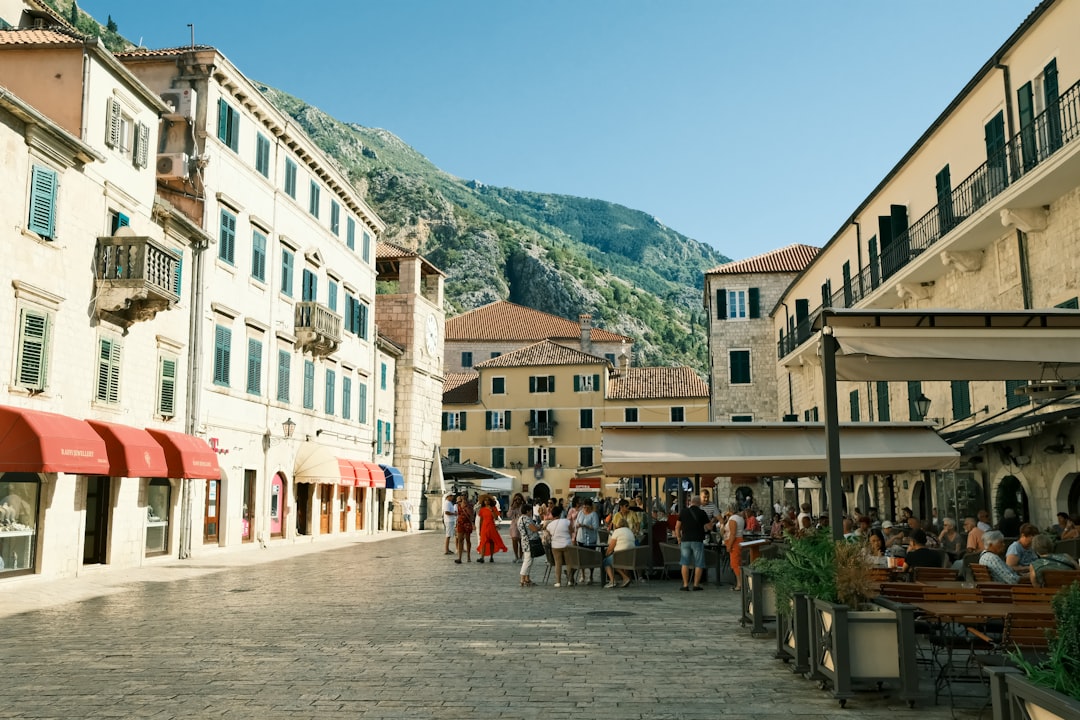 Kotor Stradun street Montenegro outdoor cafes locals eating dinner evening