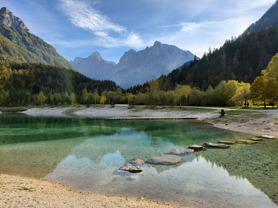 Bohinj Lake Slovenia alpine reflection clear water mountains