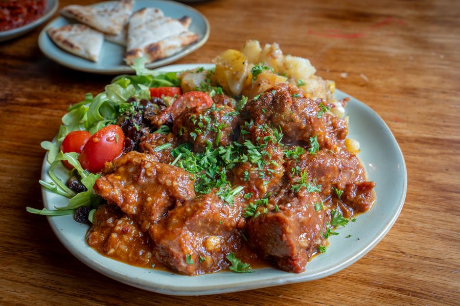 Greek stifado beef stew plate local taverna Greece
