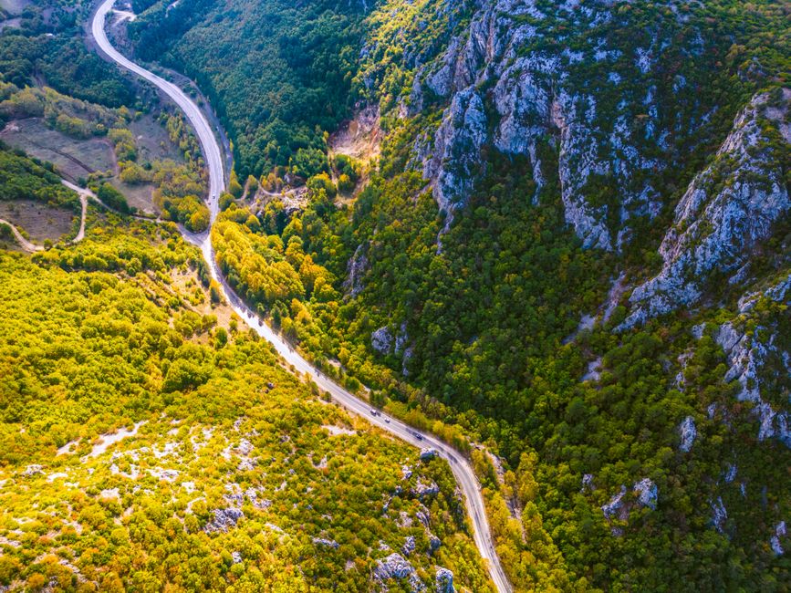 Shoshni Pass Kosovo high mountain road steep cliffs green valley