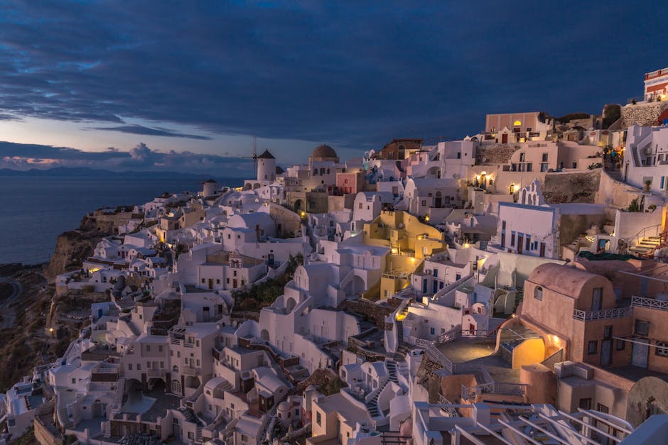 Fira nightlife Santorini bars clubs sunset view main street