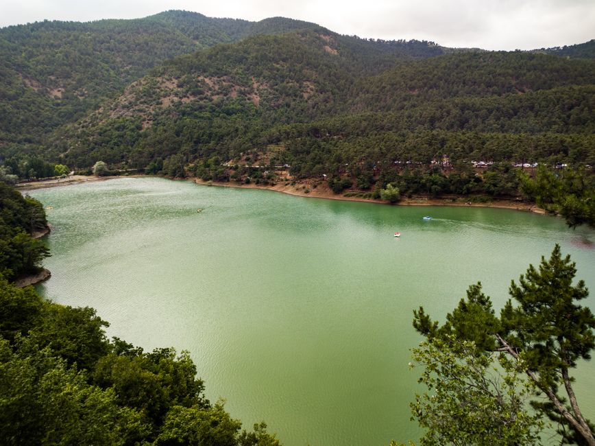 Derwent Reservoir Montenegro green water pine forest reflection