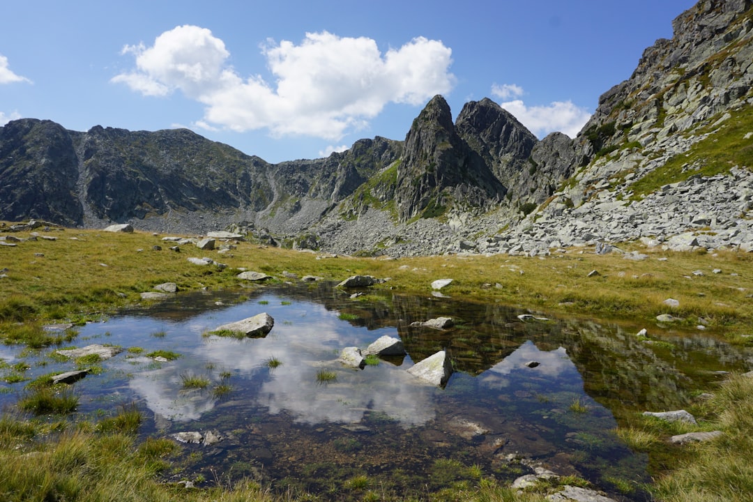 Retezat Glacial Lakes Romania reflection granite peaks morning mist