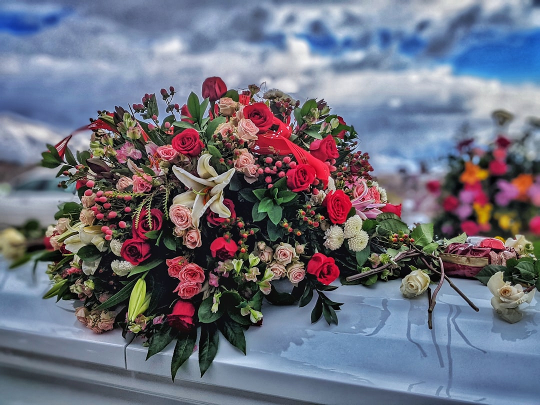 Greek mourning traditions funeral flowers close up