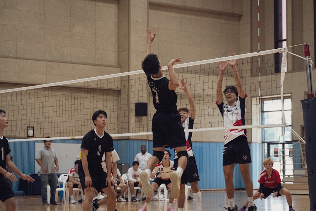 Belgian volleyball star spike action VNL match