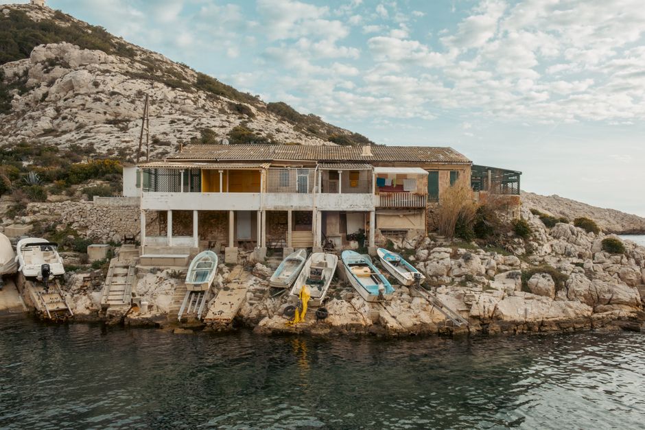 Prčanj Montenegro harbor fishing boats rocky shore