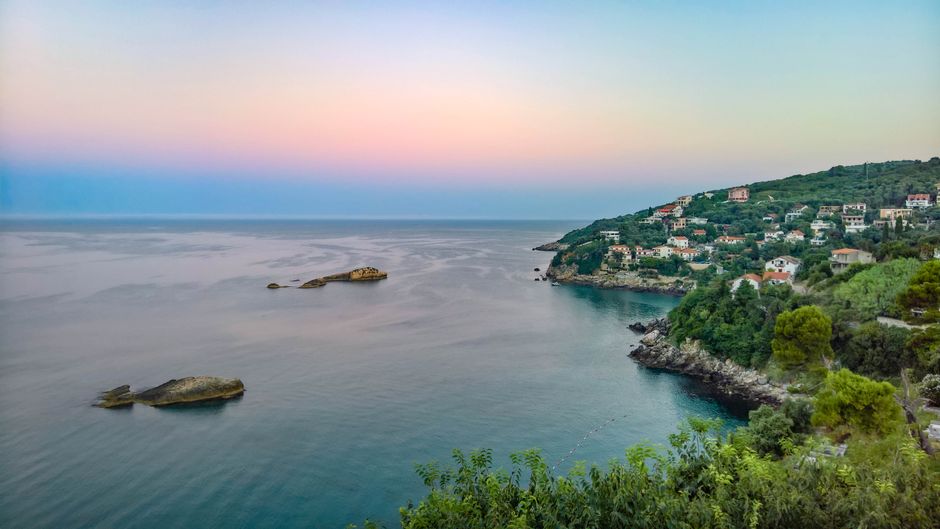 Karaburun village Albania taverna terrace evening raki
