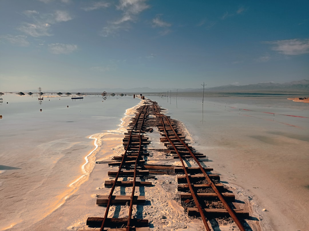 Rusty narrow gauge railway tracks Piran salt pans industrial heritage